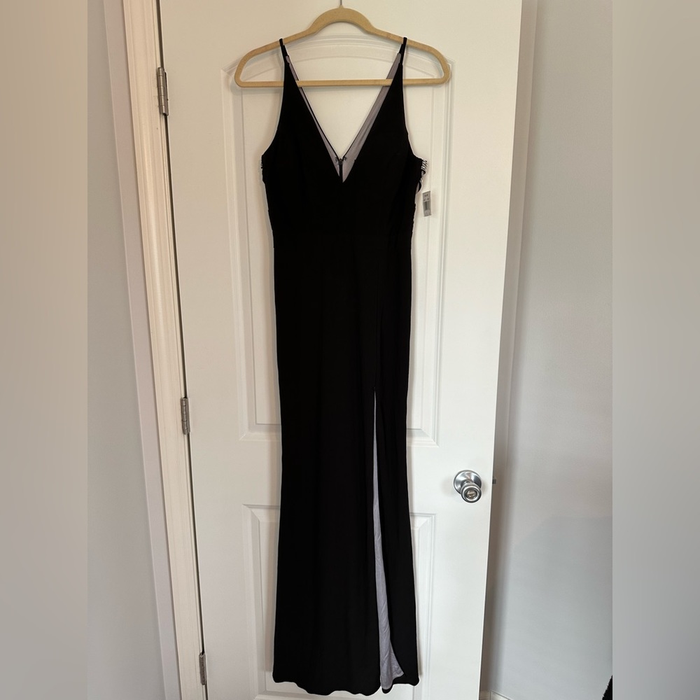 NWT Xscape formal black dress, side slit, size 6. New with tag.